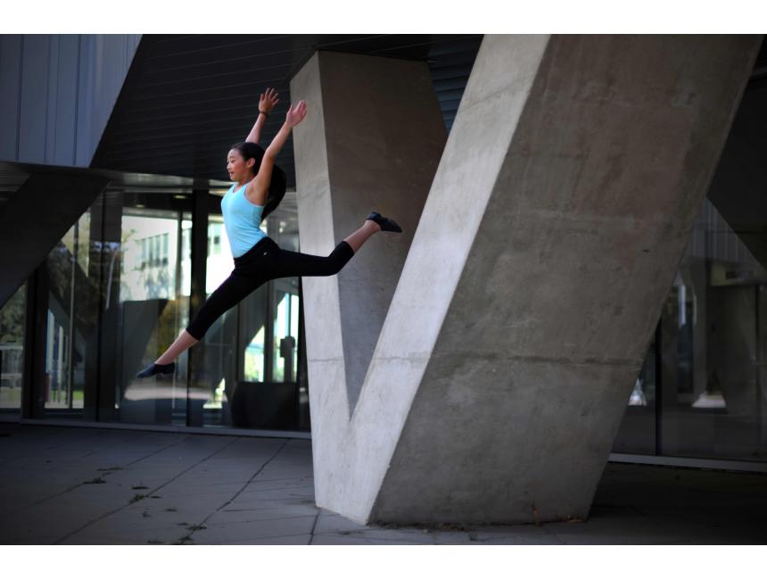 Aliyah jumping off the V-shaped columns at the University of Manitoba