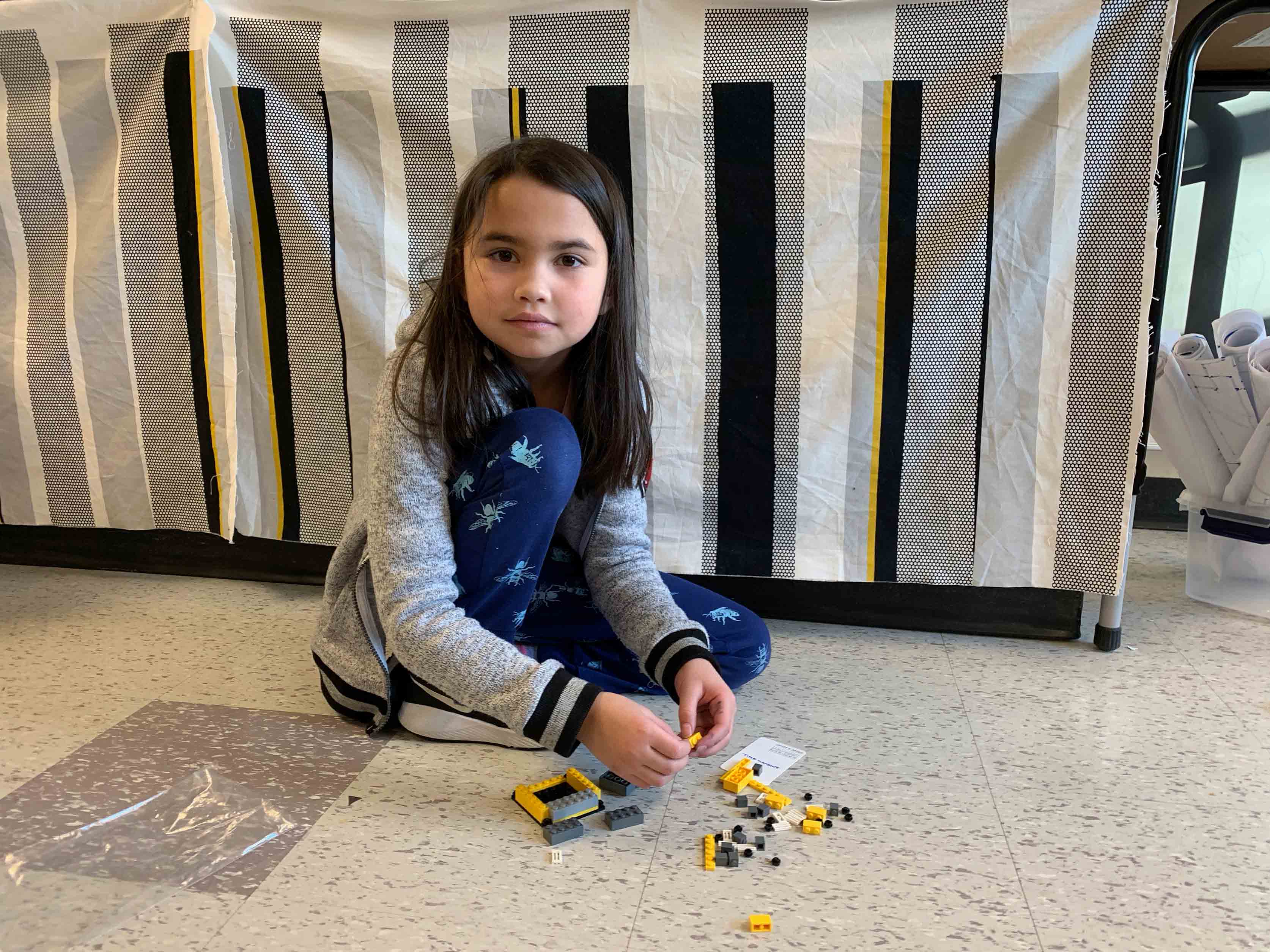 Kiera getting started on her LEGO challenge.