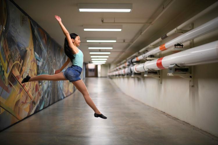 Aliyah dancing in a tunnel at the University of Manitoba